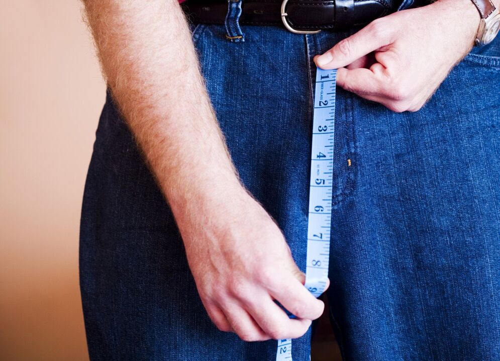 men measure the penis before enlargement with a gel